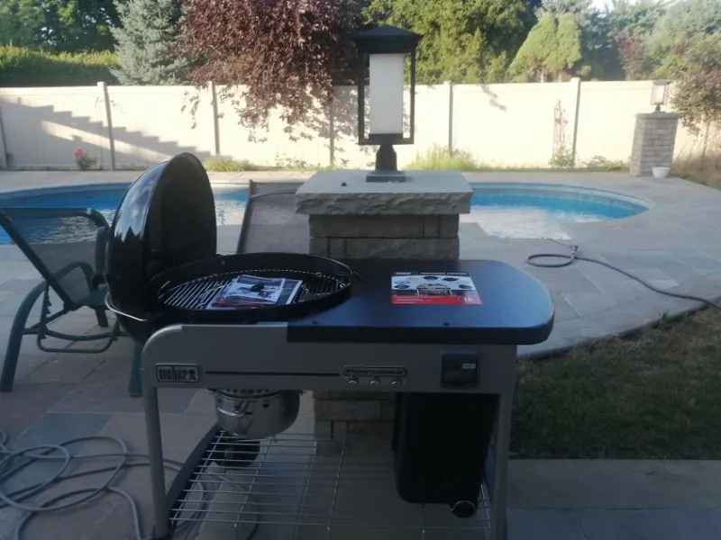 Six-burner stainless barbecue built and positioned