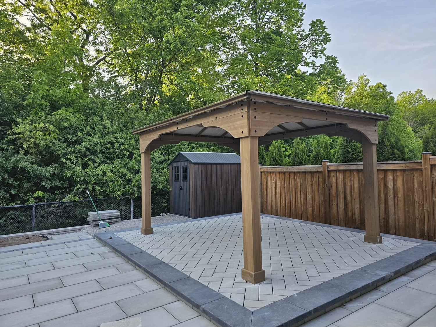Cedar pavilion and resin shed both installed by Helperama in a single visit