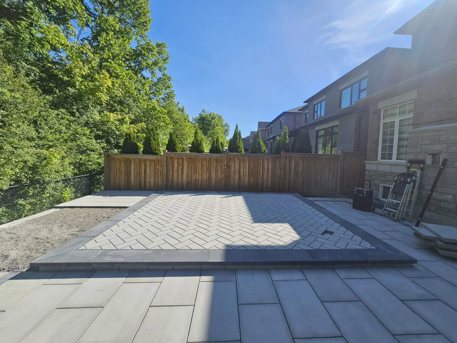 Empty herringbone patio ready for the build