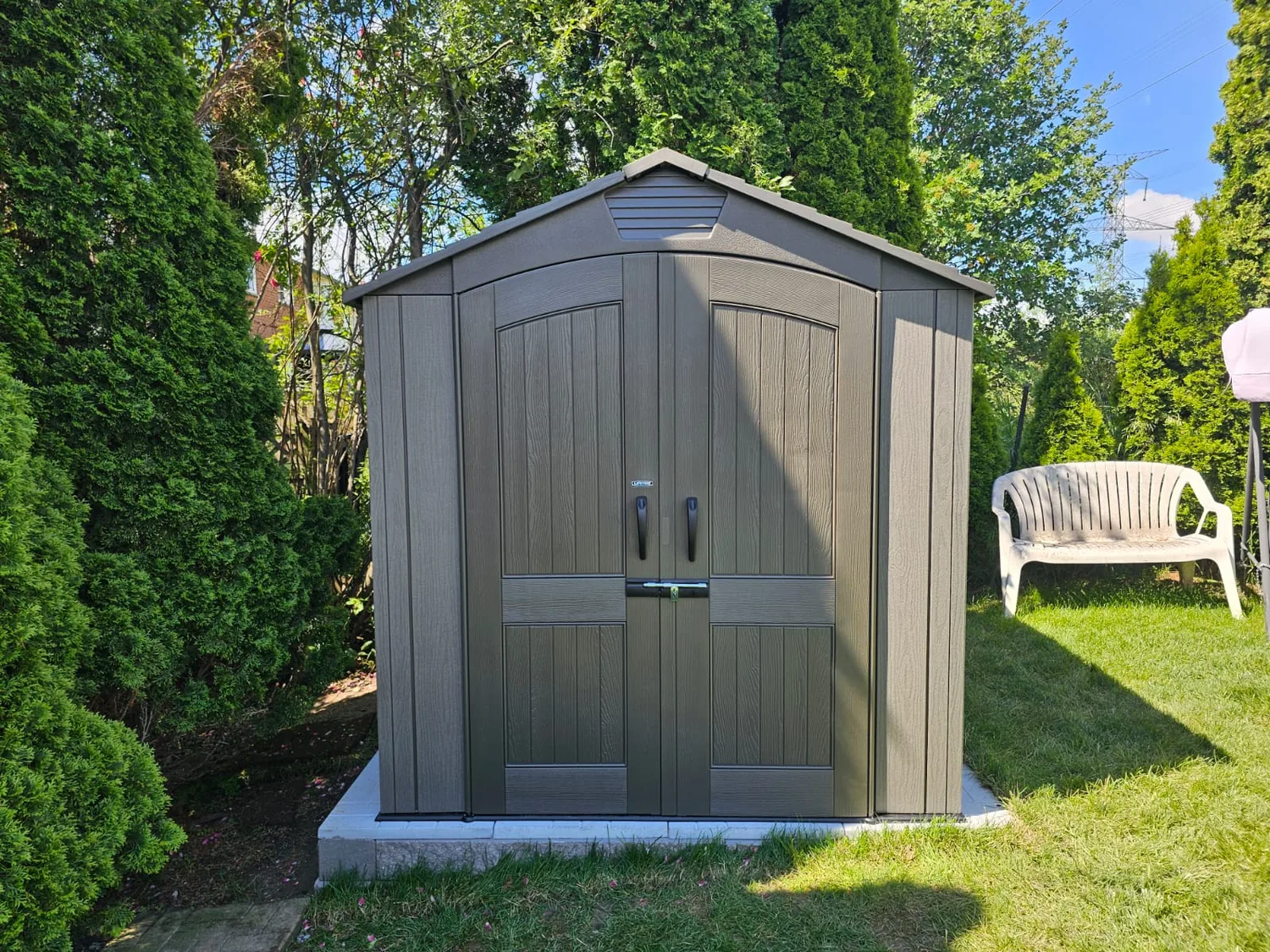 Lifetime shed on a prepared pad