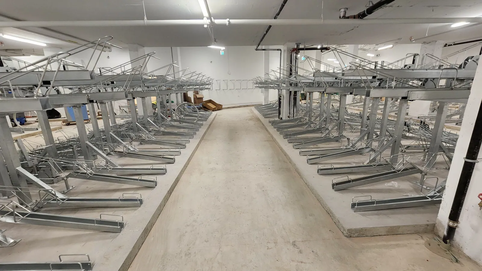 Two-tier bicycle parking racks installed in an underground garage