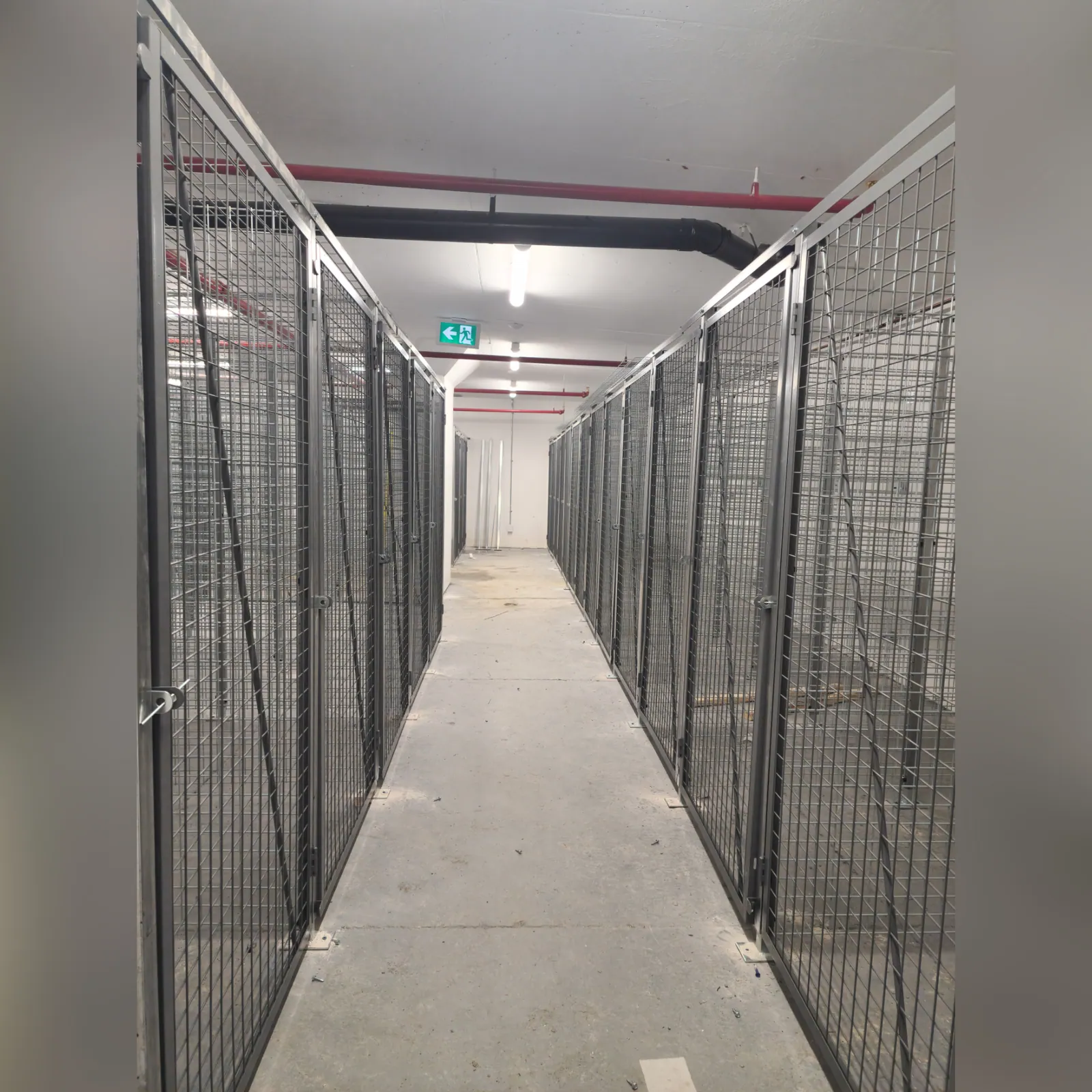 Commercial storage lockers secured to the building structure
