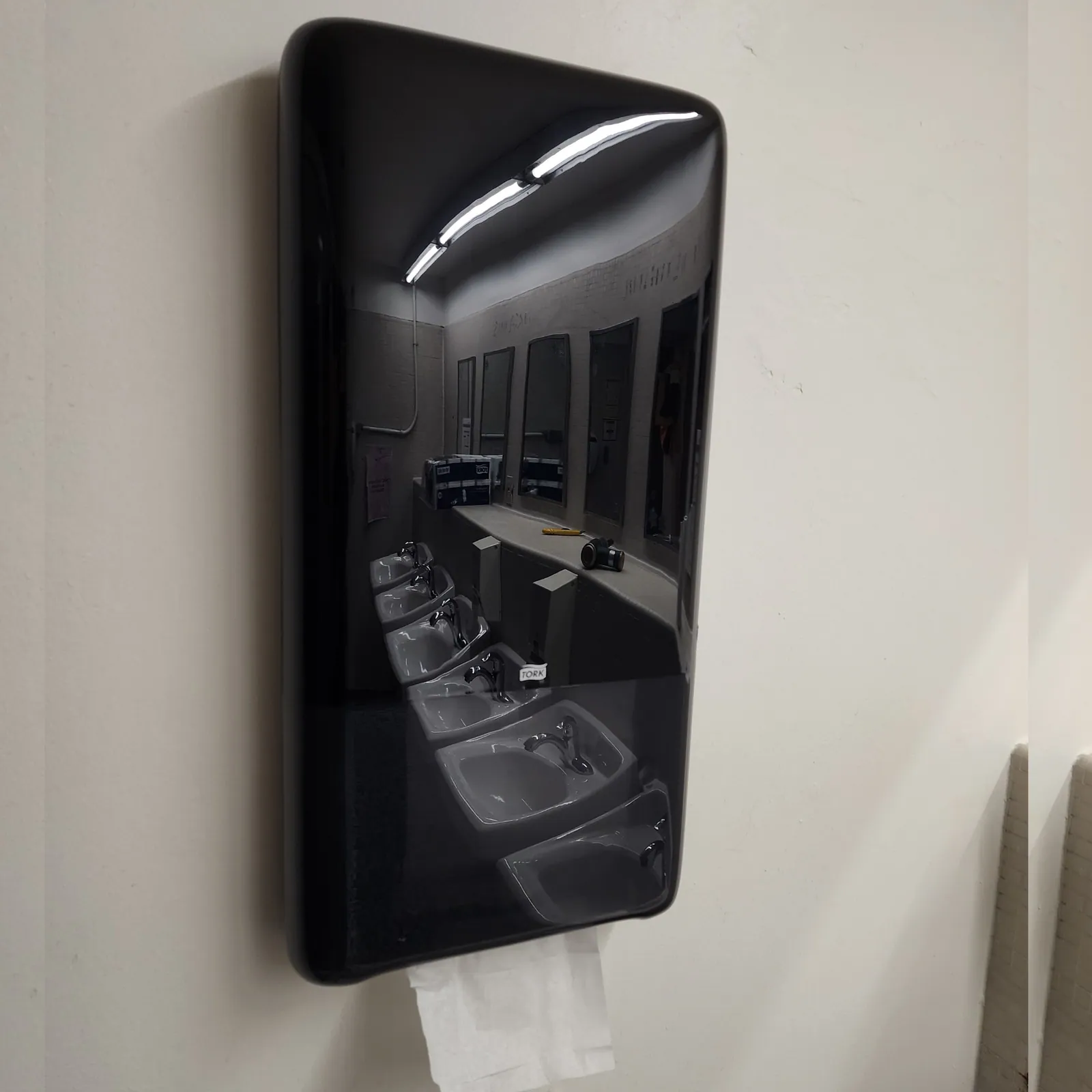 Commercial soap dispenser installed in a washroom