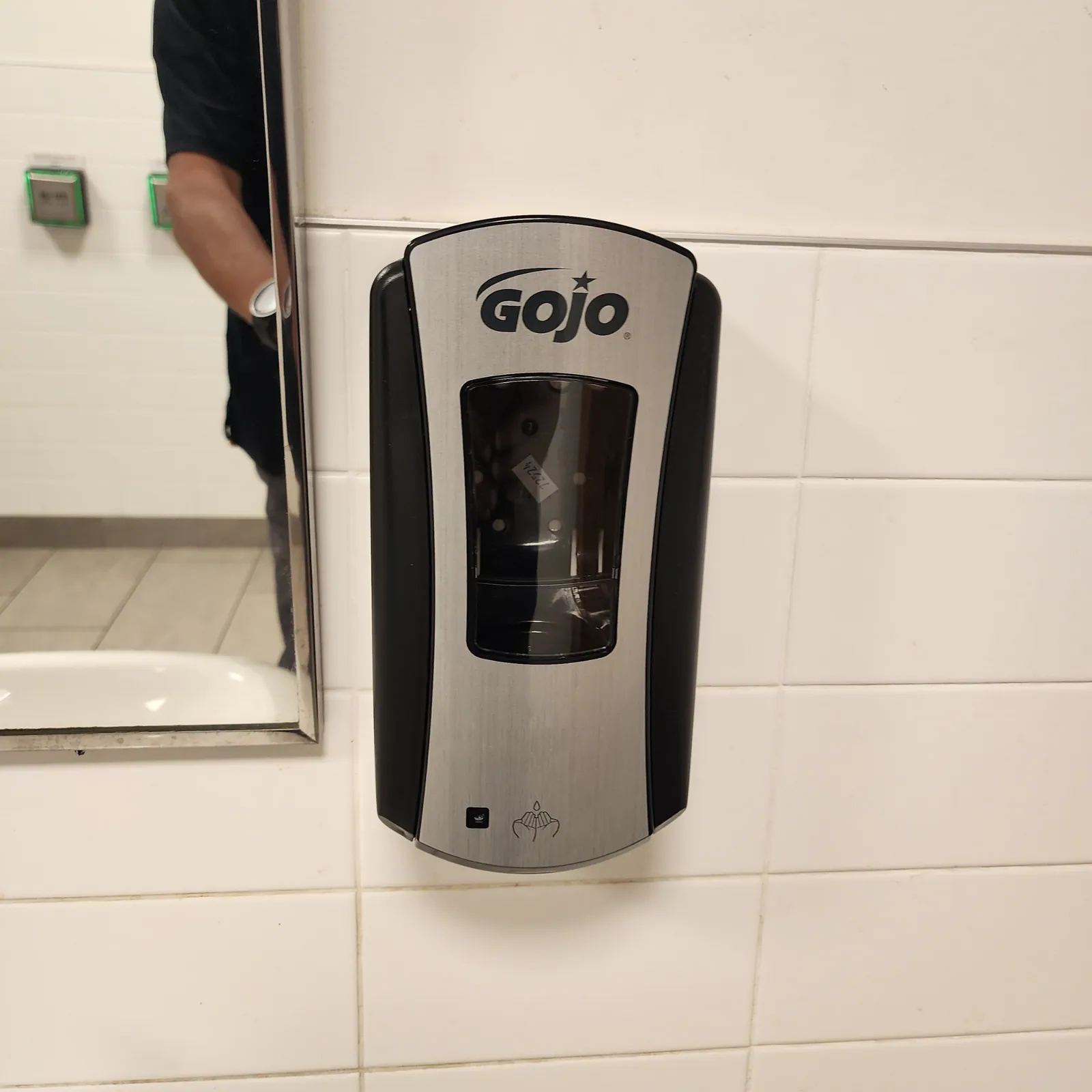 Commercial washroom accessory installation by Helperama