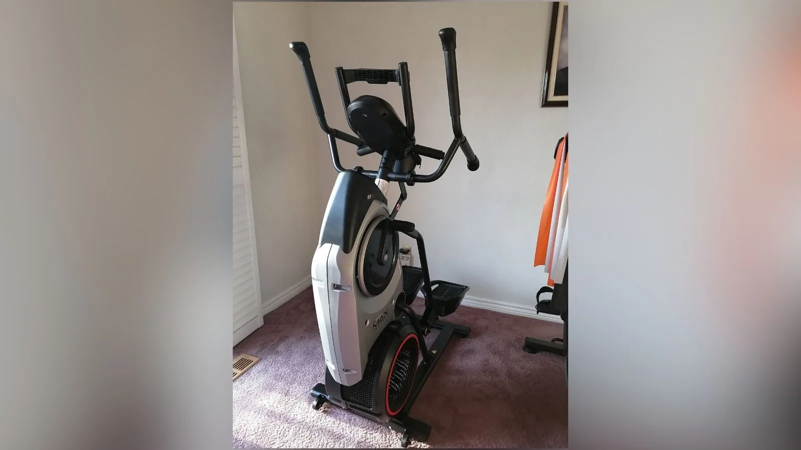 Elliptical trainer built and levelled on a gym floor