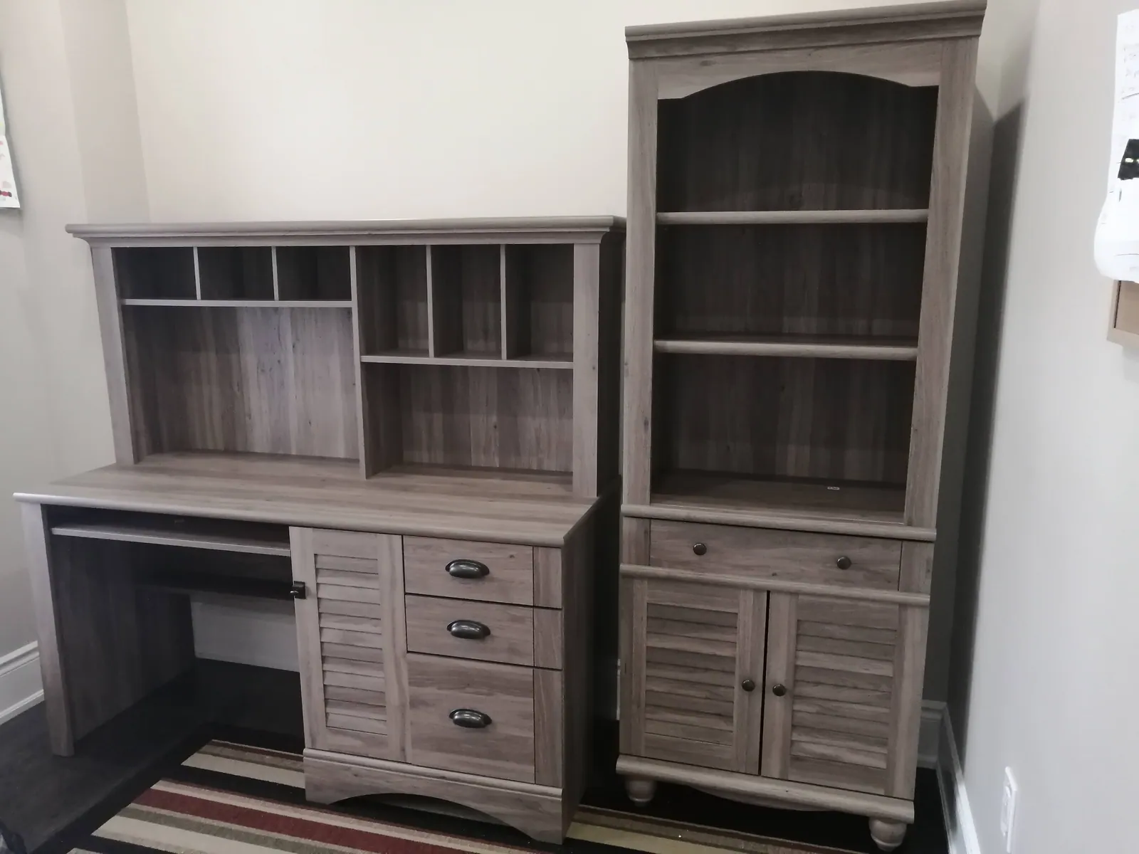 Wardrobe and dresser set built and anchored to the wall