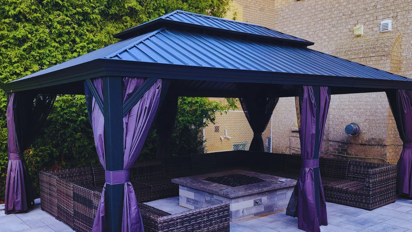 Aluminum hardtop gazebo levelled on a concrete pad