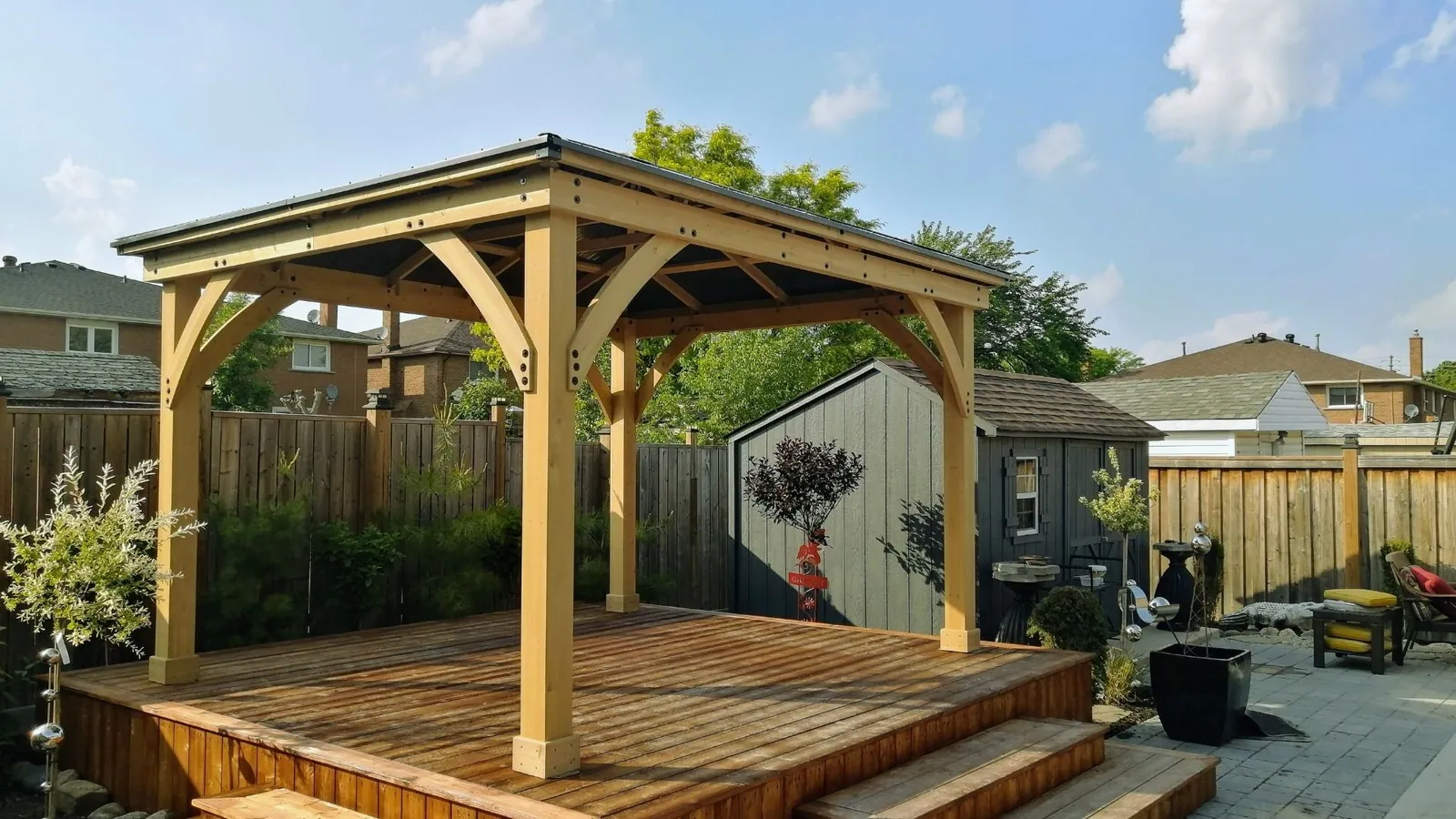 Double-roof hardtop gazebo anchored beside a swimming pool