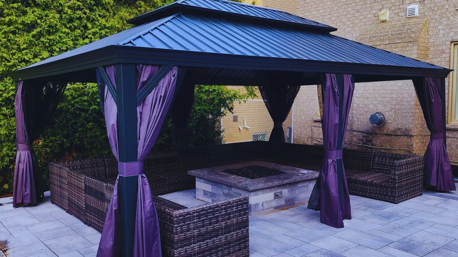 Double-roof hardtop gazebo anchored beside a swimming pool