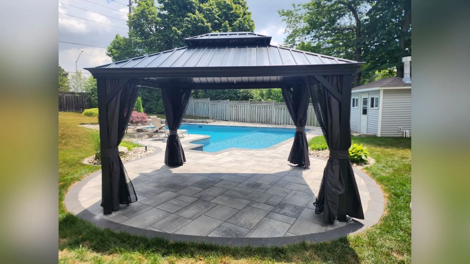 Double-roof hardtop gazebo anchored beside a swimming pool