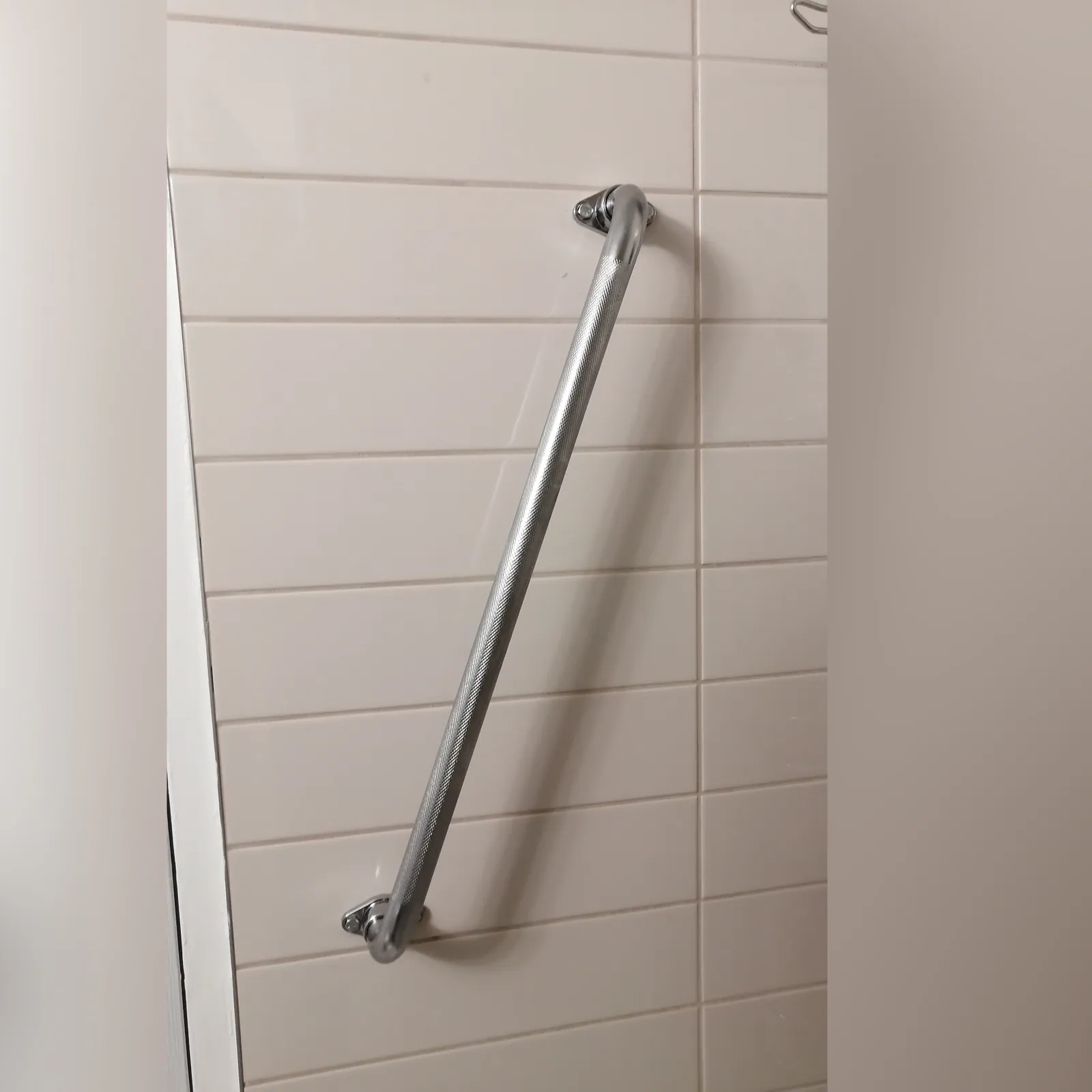 Bathroom safety bar fixed and load-tested by Helperama