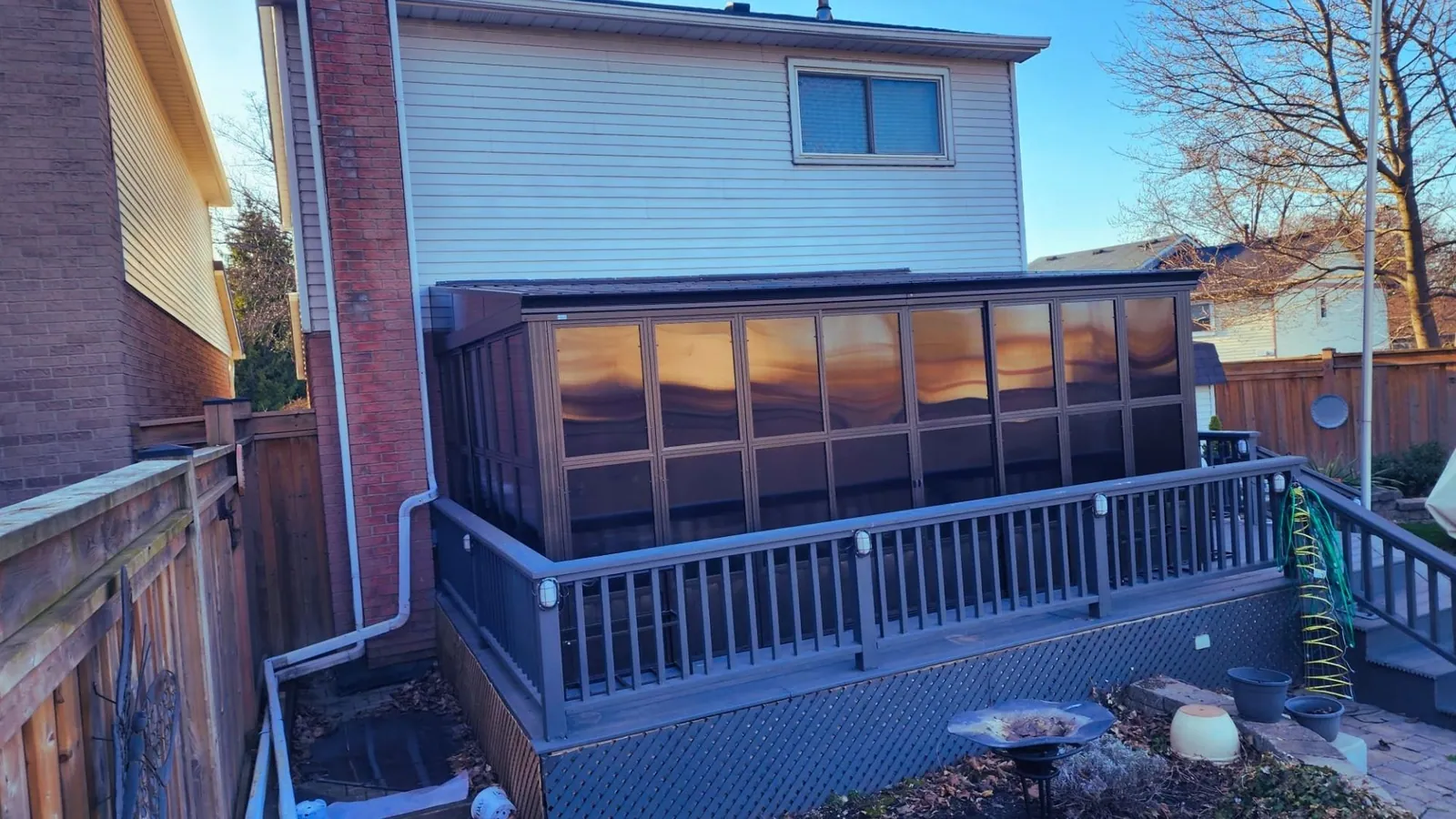 Solarium installed over a backyard deck by Helperama