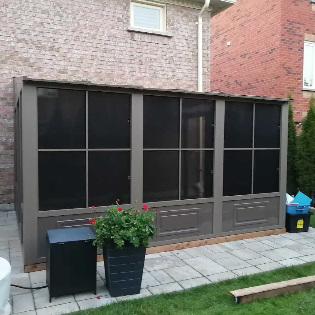 Screen room installed against the back of a GTA home