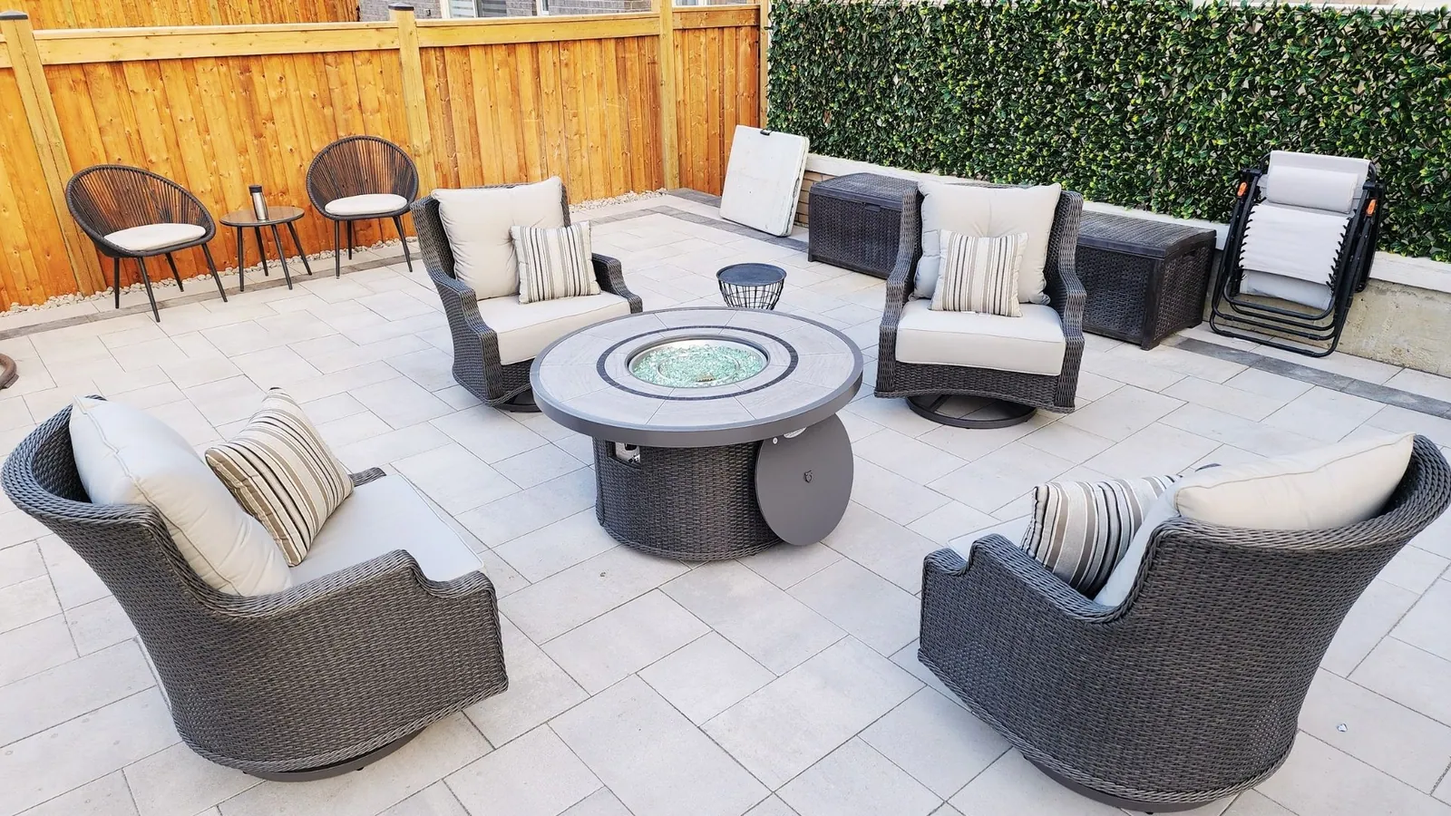 Outdoor sectional built and arranged on a stone patio