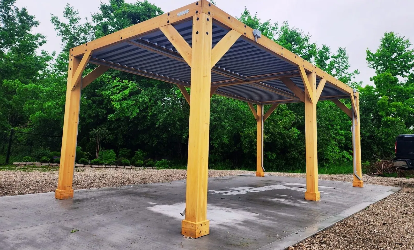 Aluminum pergola installed over a backyard patio in the GTA