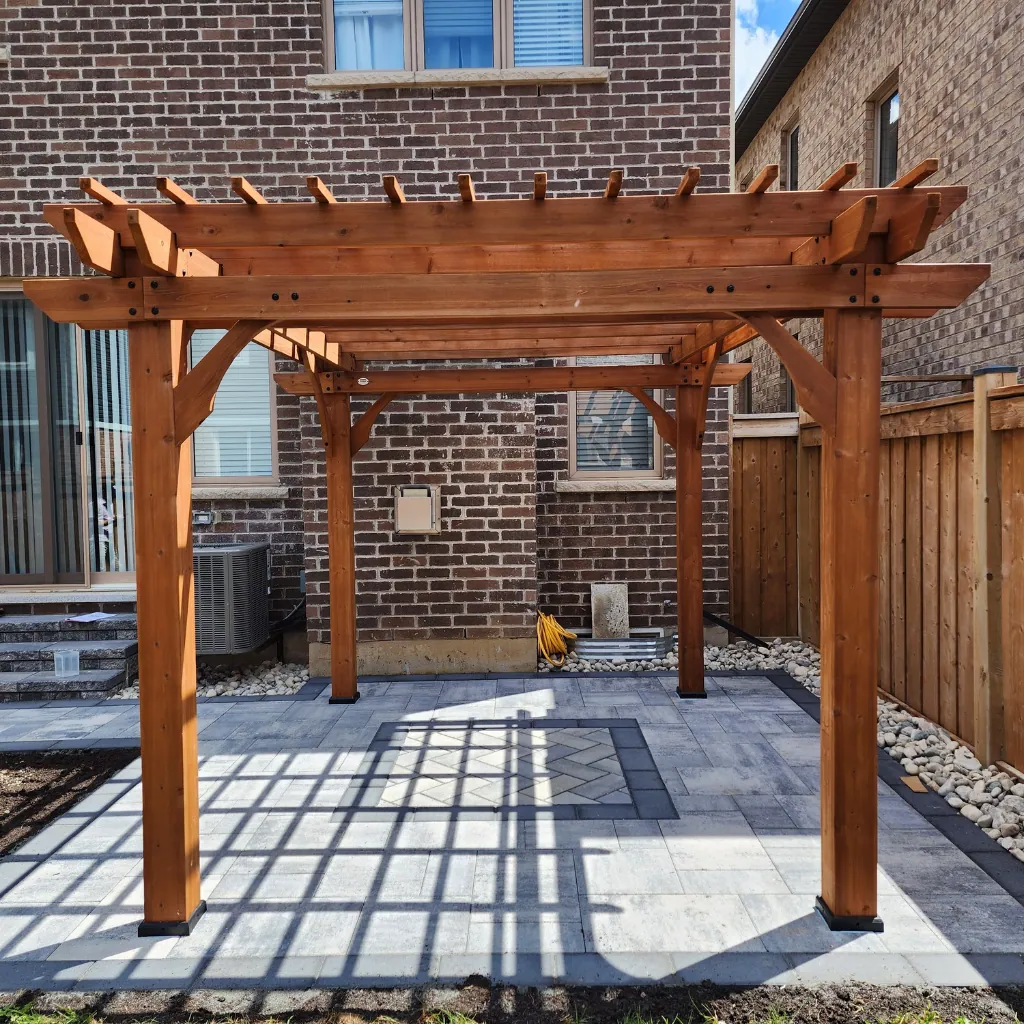 Wood pergola built over an outdoor dining area