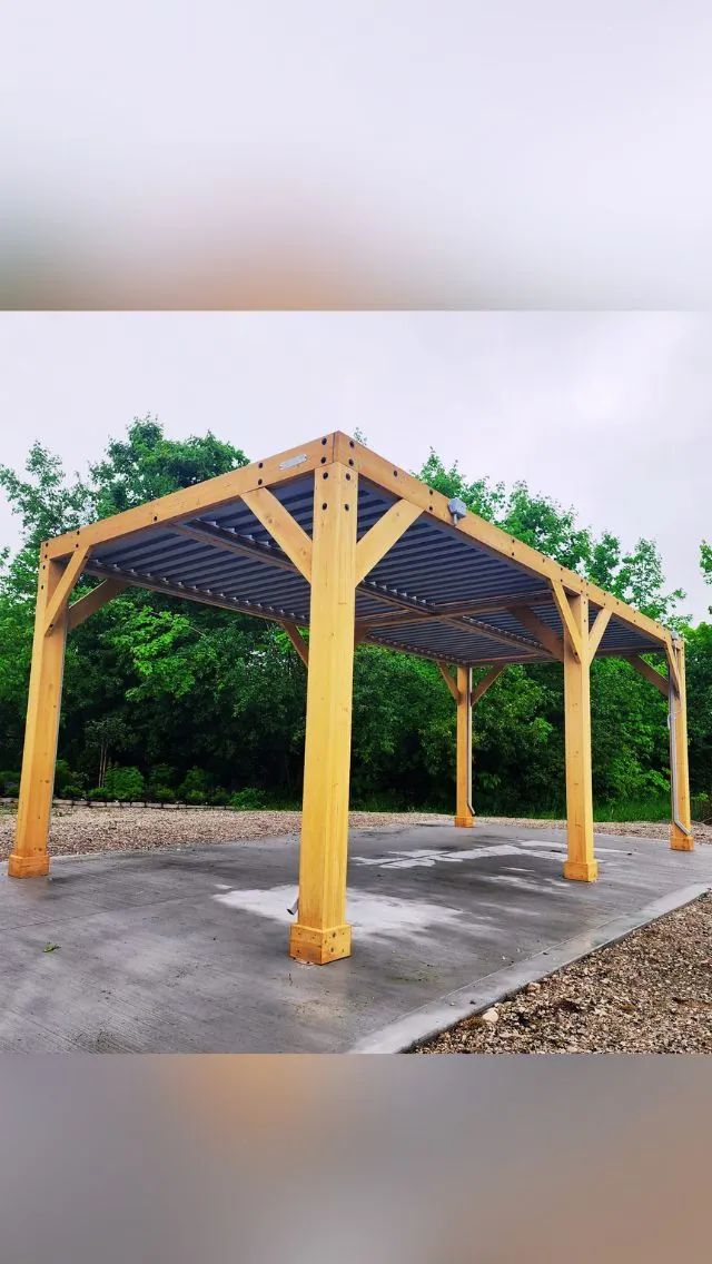 Pergola posts set plumb on an existing stone patio