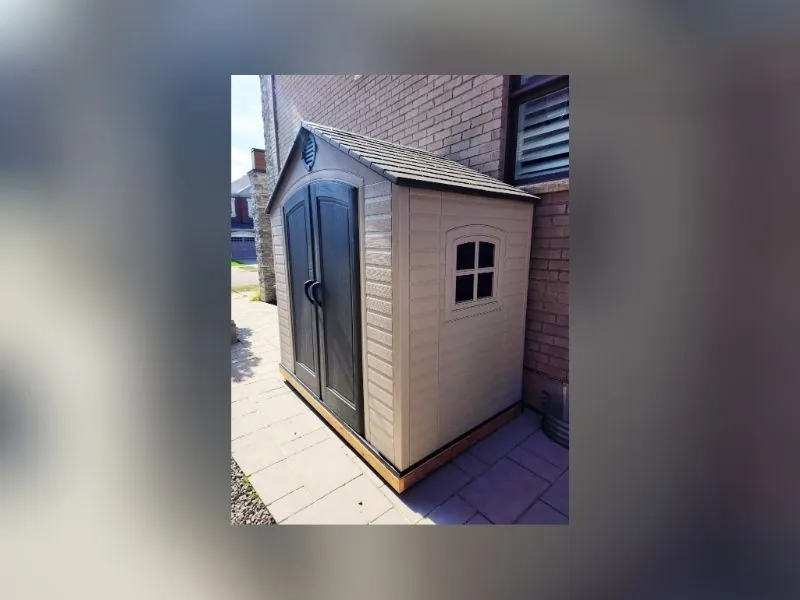 Storage shed with double doors built in a Brampton yard