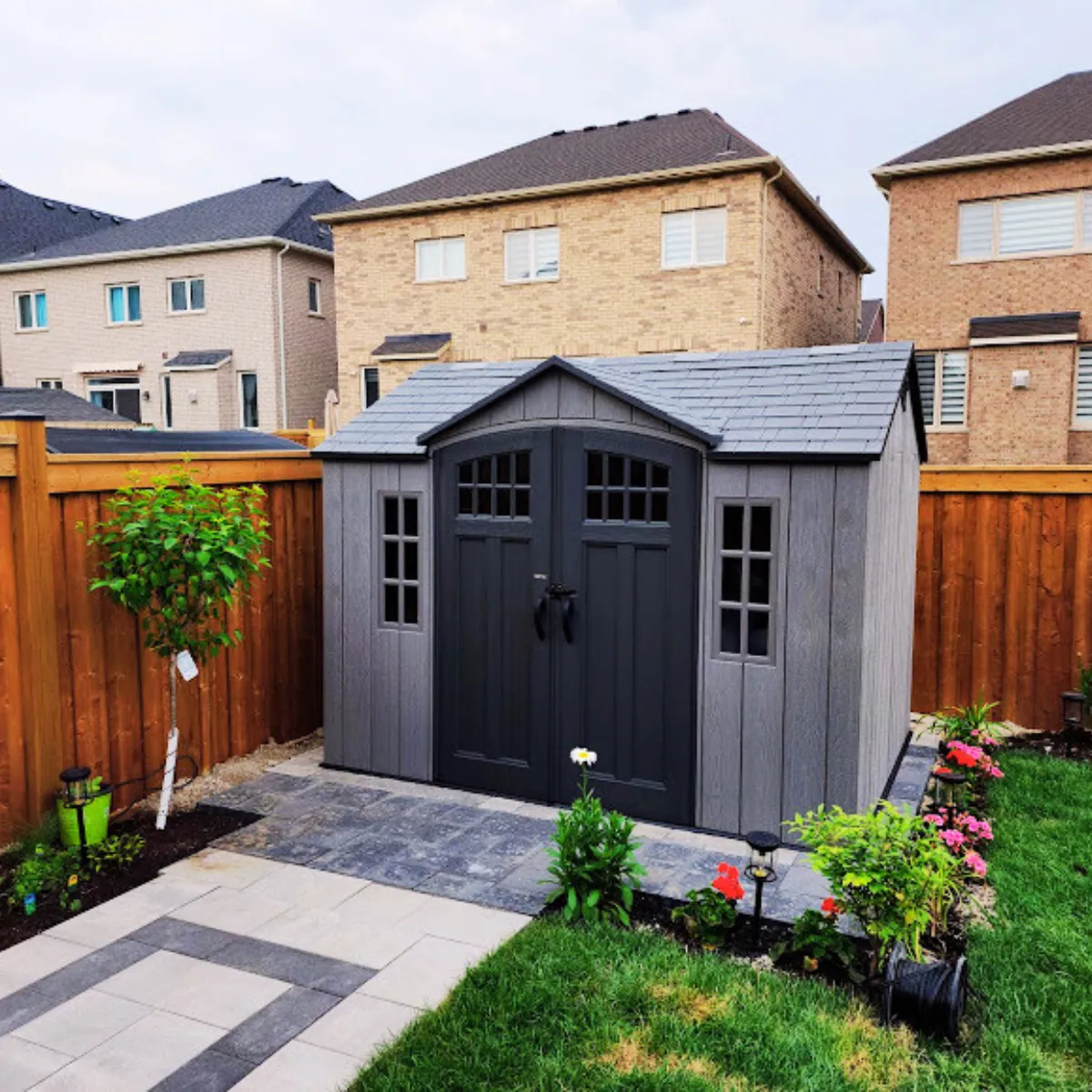Storage shed with double doors built in a Brampton yard