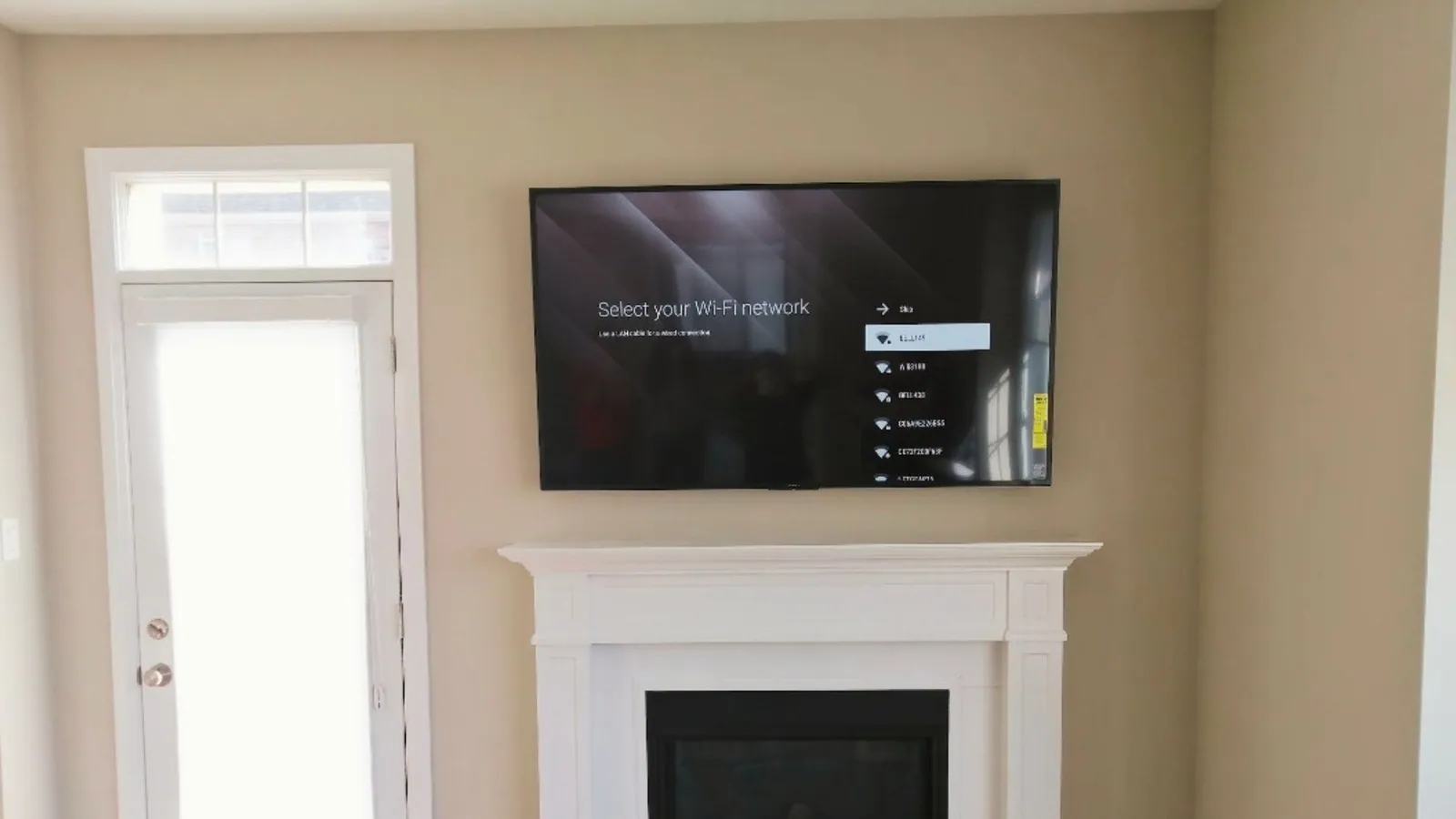 Full-motion TV mount fitted and tested on drywall
