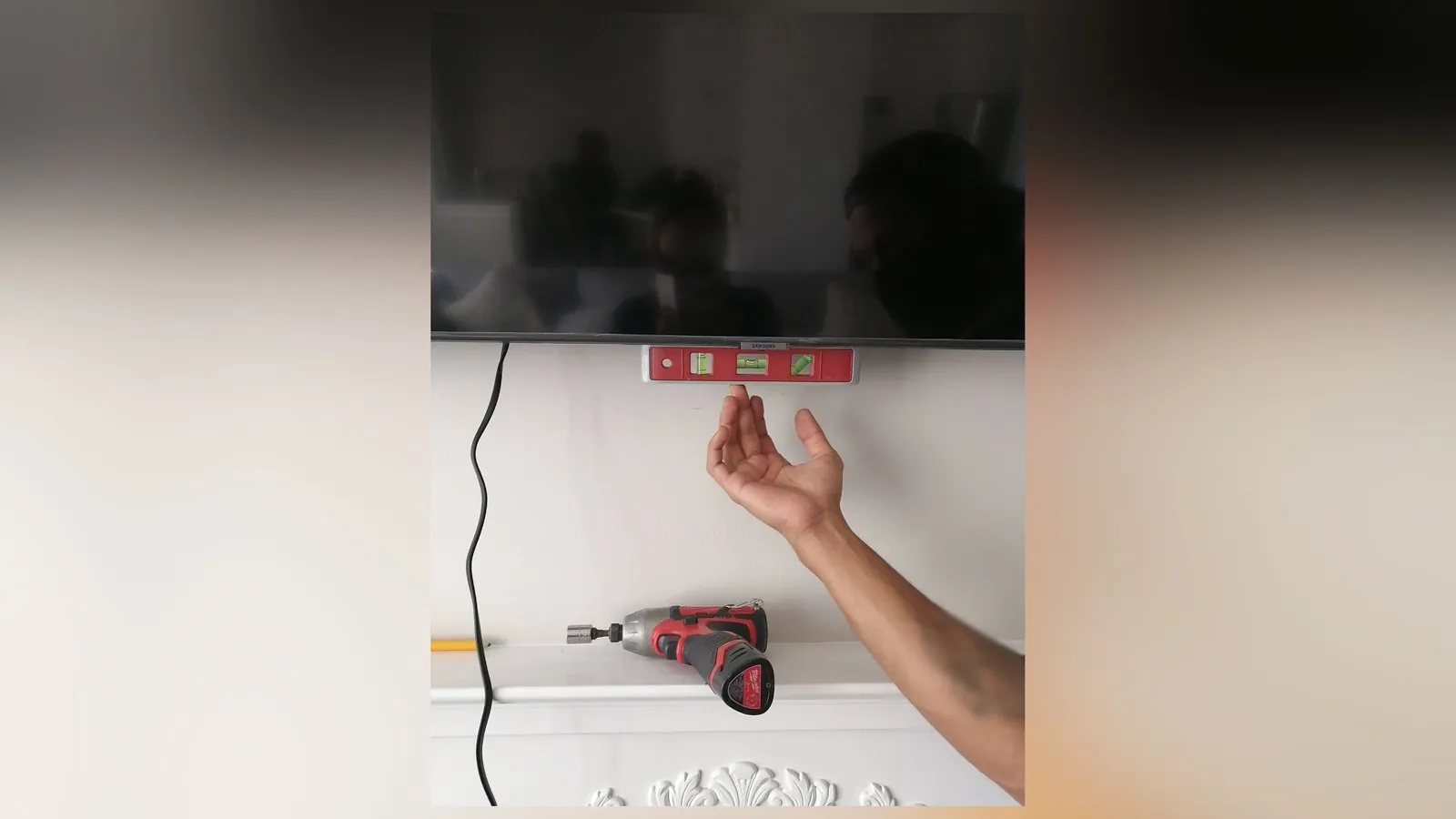Wall-mounted television installed in a GTA home