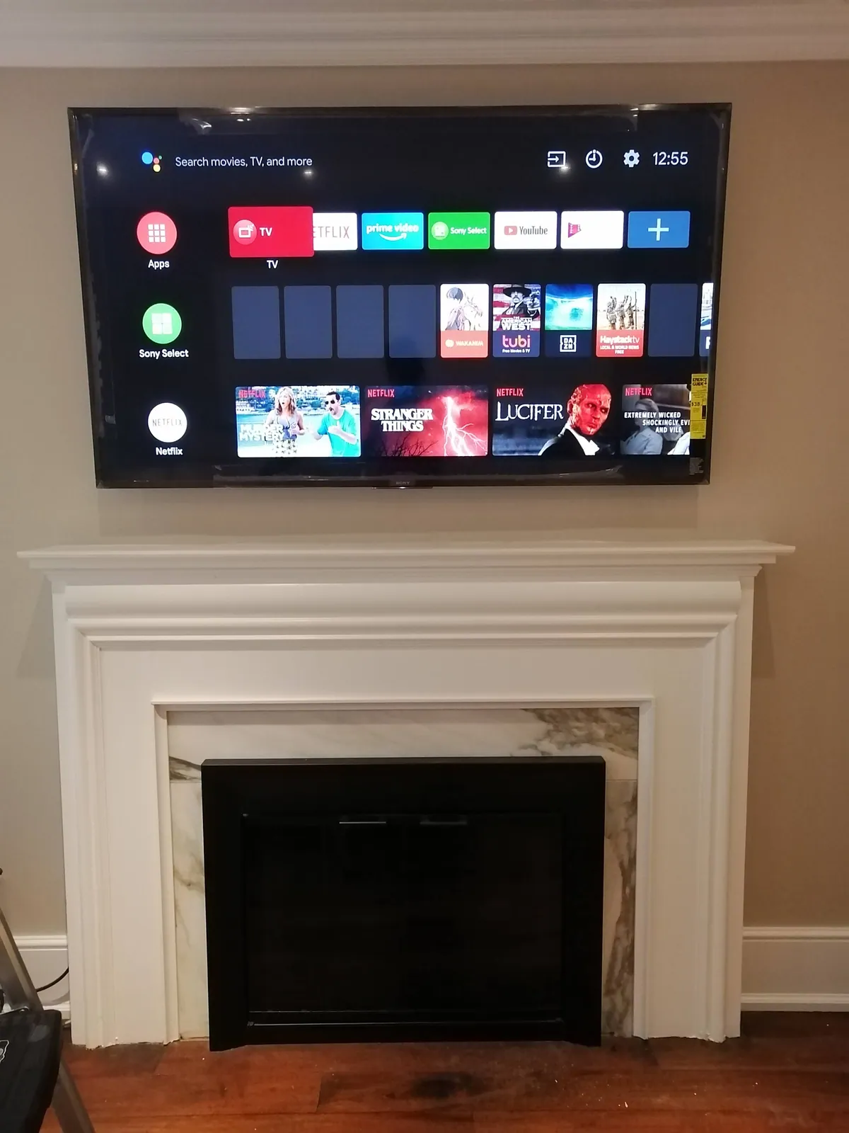 TV bracket fixed into studs before the screen is hung