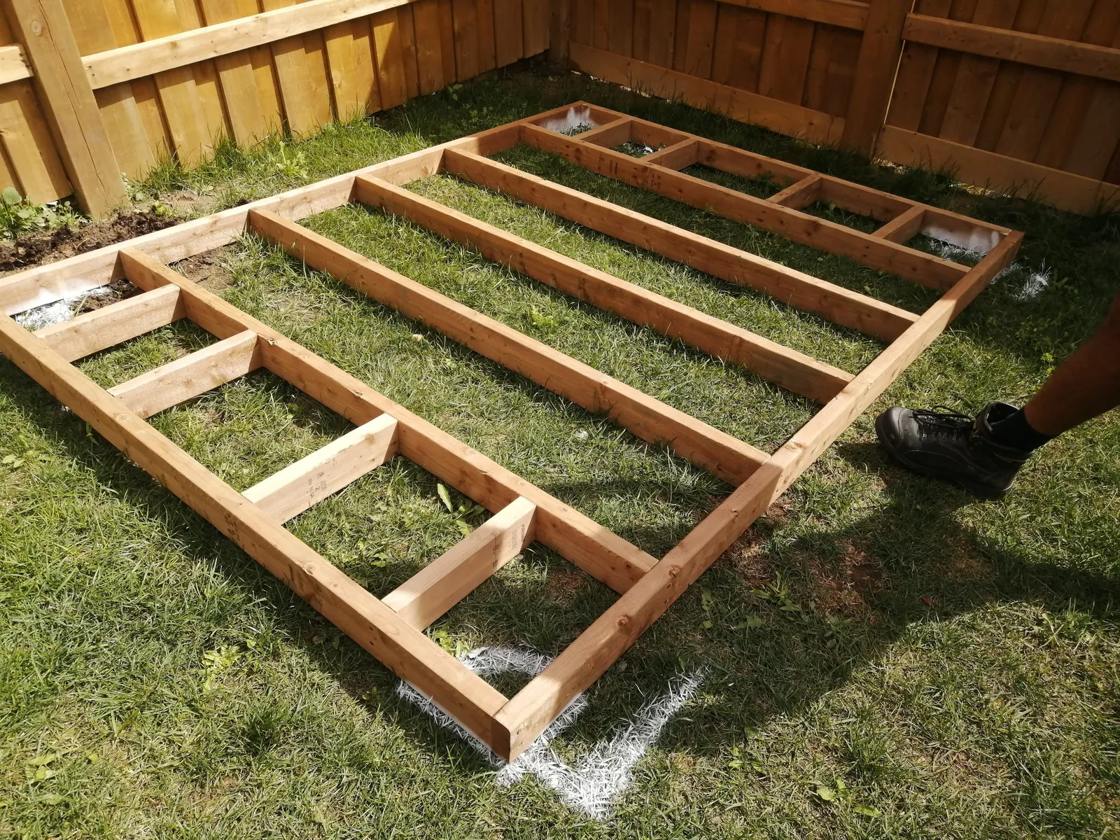 Plywood shed floor deck fixed down on a timber frame